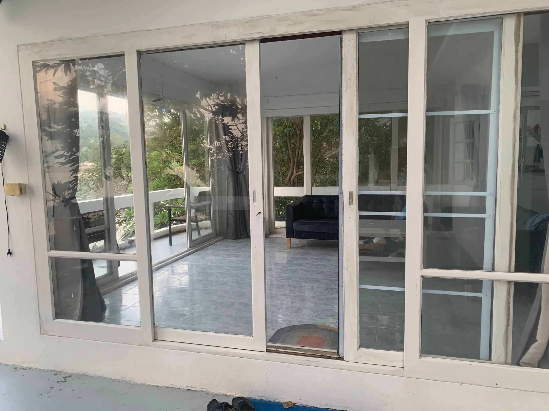 Interior glass doors at the existing Haad Salad waterfront house
